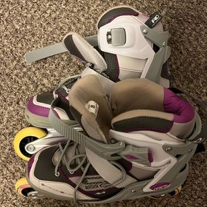 Purple Rollerblades! Never worn. Size 8.